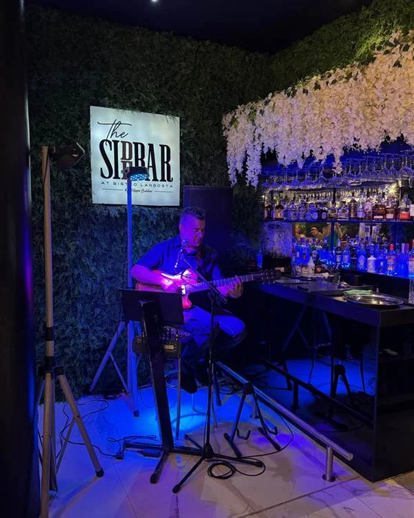 Live guitar at The Sidebar bar