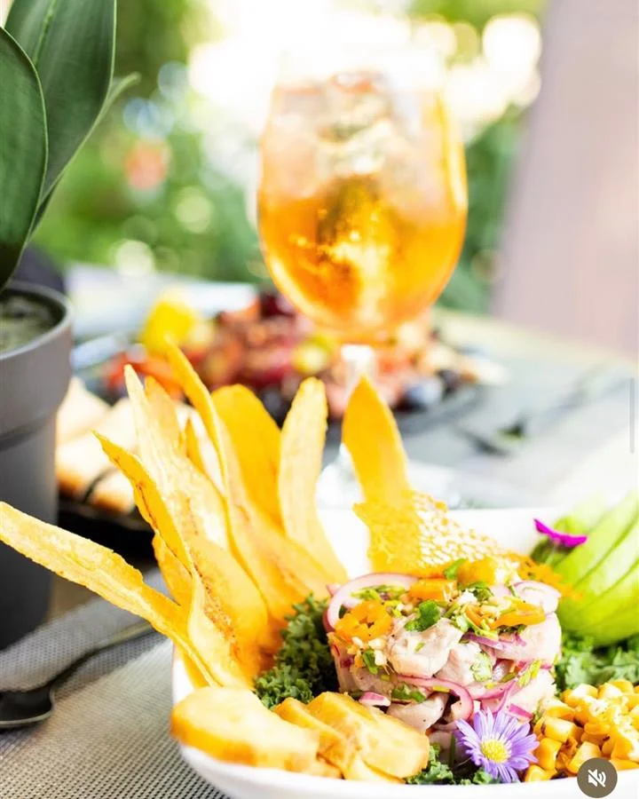 Ceviche with plantain chips and a tropical cocktail
