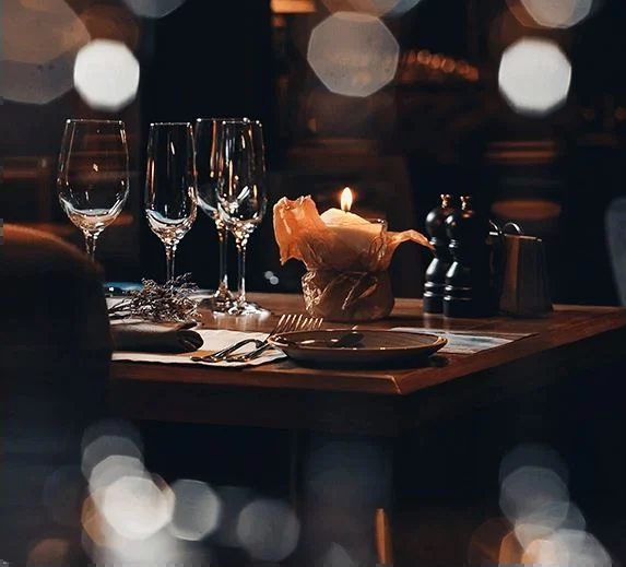 A candle-lit table at The Sidebar
