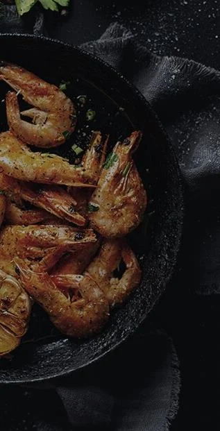 Grilled shrimp in a cast-iron pan